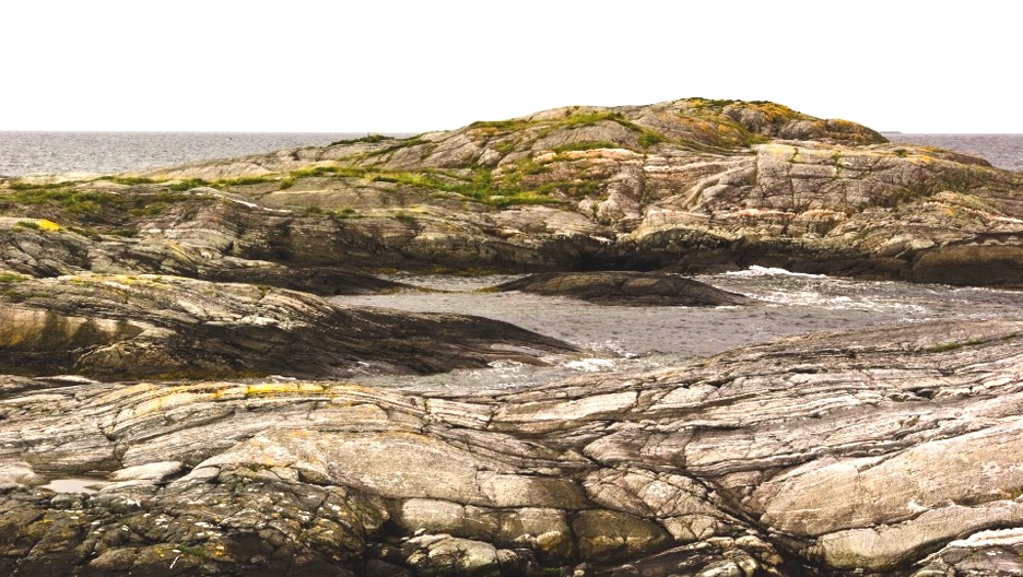 Glaciated rocks by sea