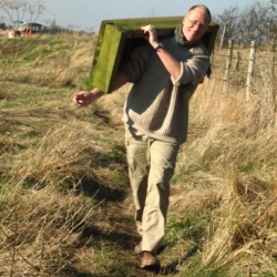 Nicholas carrying equipment